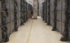 A vast mining farm with rows of ASIC miners operating under optimal cooling conditions